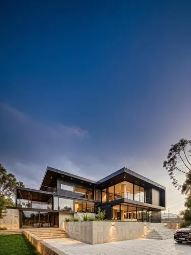 very blue sky in the background,dunes house,landscape design sydney,modern house,landscape designers sydney,modern architecture,cube house,residential house,timber house,luxury home,house by the water