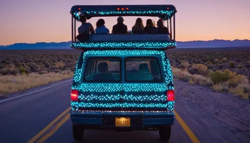 Craft a heartwarming scene where a group of friends embark on a road trip across the country using spot bikes, forging unforgettable memories.,travel van,christmas truck,christmas caravan,cybertruck,c