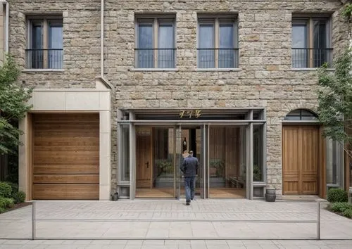 house entrance,hinged doors,courtyard,the threshold of the house,steel door,landscape design sydney,paved square,garden elevation,garden door,paving slabs,stone house,limestone wall,glass facade,front