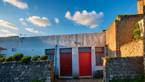  colour full ,a red door and two windows on a building,masseria,greek island door,eustatius,eleuthera,outbuildings,lifou,outbuilding,africville,blaye,storehouses,trulli,vivienda,guesthouses,beaugency,