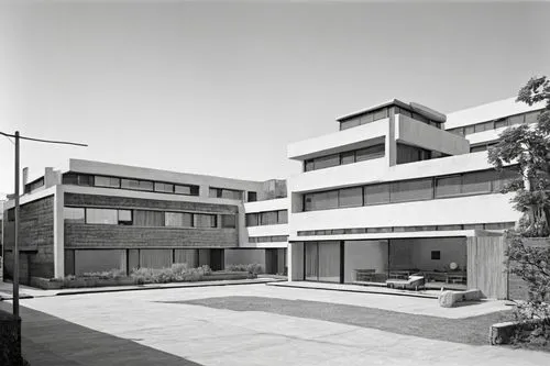 Modernist architectural style, 5 points, Le Corbusier, functionalism, clean lines, rectangular forms, pilotis, roof garden, horizontal windows, free plan, open floor, minimal ornamentation, brutalist 