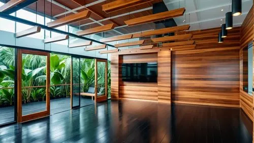 a tropical offcie interior in wood and glass with a black floor,the wooden wall of an indoor room is full of plants,interior modern design,contemporary decor,glass wall,modern decor,bamboo curtain,mod