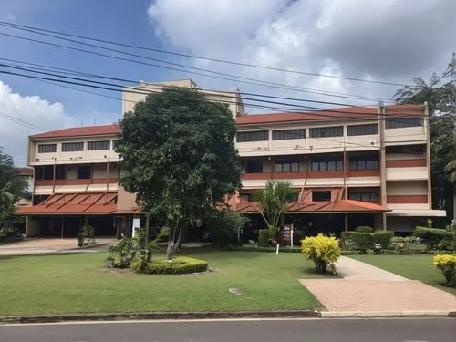 A Thai style boutique hotel that overwhelming with a hundred of tropical plants.
The lawn in front of the hotel is full of tropical trees.
The driveway to the hotel is decorated with slates.
Solar cel