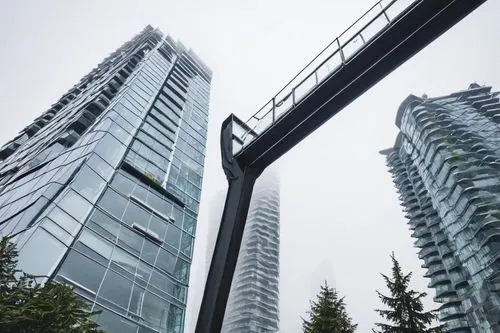 Vancouver, modern architecture, skyscrapers, glass towers, steel beams, sleek lines, urban cityscape, foggy morning, misty atmosphere, Granville Island, waterfront, sailboats, seagulls flying overhead