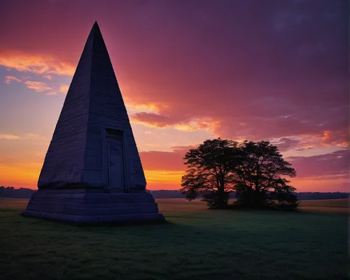 Create a melancholic poem inspired by the silent beauty of an obelisk tomb at dusk.,obelisk,obelisk tomb,witches hat,burial mound,witches' hats,derbyshire,monument protection,light cone,protected monu