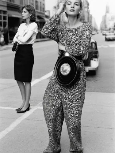 Two different women.,two women standing next to each other on a street,signoret,winogrand,gena rolands-hollywood,vintage 1950s,marylin,marylin monroe,Photography,Black and white photography,Black and 