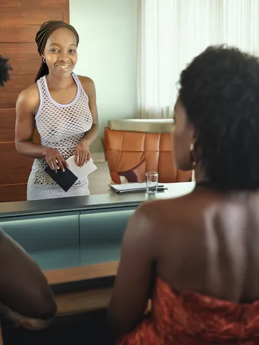 Beautyfull busted african woman casting for a new job in front of the  jury of the big company,black women,beautiful african american women,receptionist,artificial hair integrations,receptionists,afro