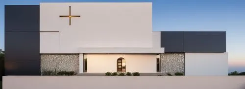 exterior front facade of a residencial house. Main entrance with stairs. The wall made of stucco and natural stones. There is a geometrical mosaic on the left side.  Some vegetation around ,schoenstat