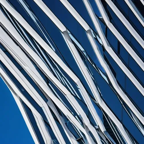 Rice Fergus Miller modern architecture, skyscraper, futuristic design, reflective glass facade, steel structure, geometric patterns, urban cityscape, daytime, clear blue sky, few white clouds, dramati