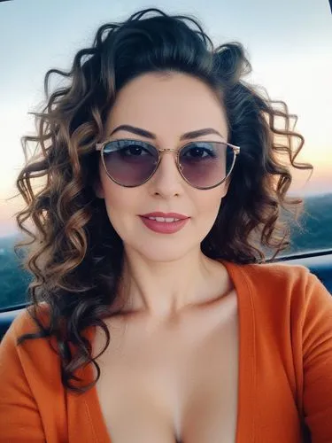 a beautiful woman in sunglasses on the back seat of a car,scherfig,anfisa,joumana,giulia,haifa,roni