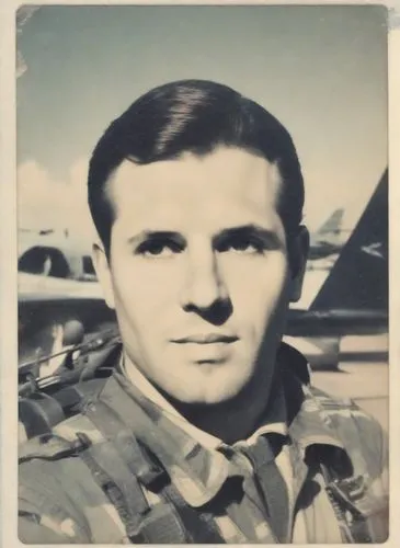 vintage black and white po of a man in uniform with fighter planes in the background,ekwueme,korematsu,kanojia,kenzaburo,masakatsu,abuelo,Photography,Polaroid