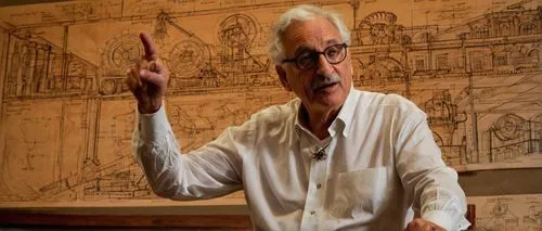 Masterclass, Frank Gehry, teaches design and architecture, mature male, gray hair, glasses, white shirt, black pants, standing, lecturing, gesturing, auditorium, wooden chairs, modern architecture mod