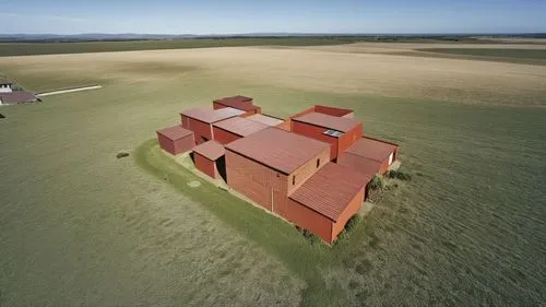 an aerial view of a house surrounded by wheat fields,dunes house,3d rendering,holkham,cube stilt houses,crown engine houses,sketchup,cardington,elvington,thiepval,grain storage,grain elevator,photogra