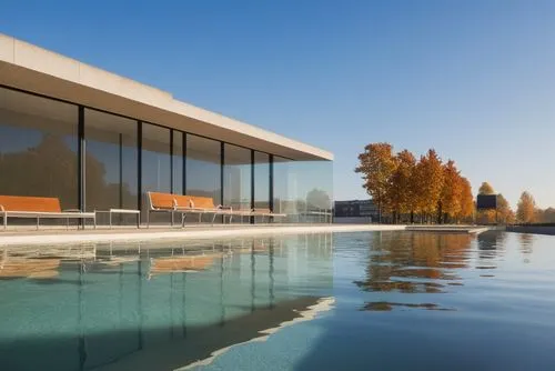 pool house,infinity swimming pool,house by the water,amanresorts,house with lake,snohetta