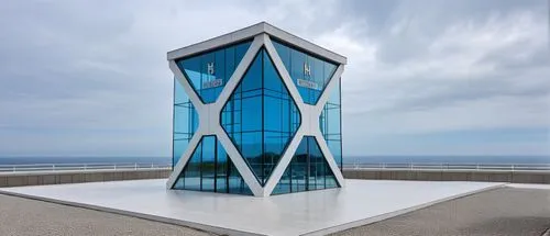 A modern Cafe building, named H N F, in a luxurious area and modern style, in white color with blue reflective glass - no wood is used,a large modern building sits in the middle of the roof,the observ