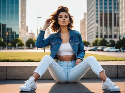 iPhone, smartphone, Instagram app, social media, modern woman, 20s, trendy hairstyle, minimal makeup, casual wear, denim jacket, white crop top, high-waisted jeans, sneakers, sitting, urban background