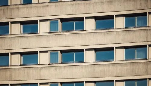 Bauhaus, German architecture, modernist style, geometric shapes, rectangular forms, clean lines, minimal ornamentation, functional simplicity, steel frames, large windows, flat roofs, cantilevered bal