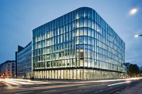 Futuristic, conceptual, Deutsches Gewerbebau (degw) building renovation, modernized exterior, glass façade, metallic framework, LED lighting, curved lines, asymmetrical structure, urban landscape, cit