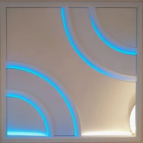 Gypsum decoration in the ceiling of a room with hidden LED lighting,light shines brightly through the round windows in an otherwise futuristic room,flavin,ceiling light,wall light,ceiling lighting,wal