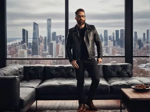 Shawn Henderson, interior designer, male, 35-40yo, stylish beard, messy brown hair, glasses, black leather jacket, white shirt, dark jeans, holding a coffee cup, standing in a modern luxury living roo