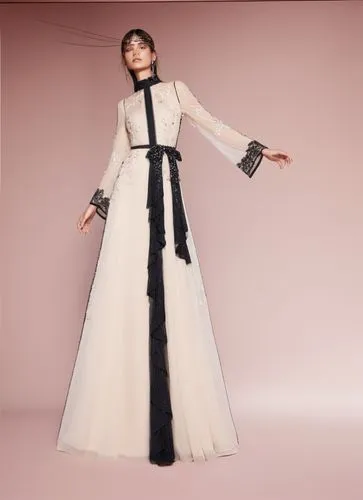 a woman wearing a white gown with black accents,tonghe,homogenic,kimbra,dior,kawakubo,hanbok,Photography,Fashion Photography,Fashion Photography 09