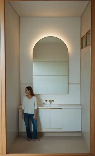 a nice bathroom, with a beautiful lady ,a woman looks at herself in a mirror,corian,wood mirror,modern minimalist bathroom,banyo,recessed,lavatory,Photography,General,Natural