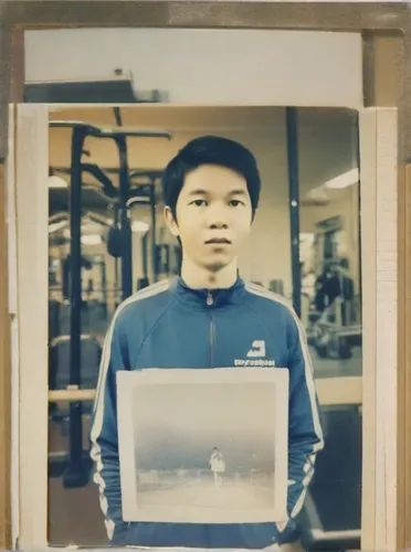 holding a frame,digital photo frame,weightlifting machine,old frame,photo frame,young coach,picture frame,retro frame,kai yang,paper frame,apple frame,framed paper,vintage asian,powerlifting,weightlifting,wood frame,staff video,weight lifter,gold frame,weightlifter