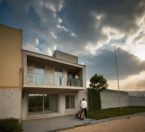 In the heart of the urban jungle, a modern modern house with rich, textured lines and geometric shapes sits proudly against the backdrop of a deserted urban landscape. The house is made of concrete an