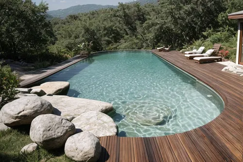 wooden decking,outdoor pool,infinity swimming pool,dug-out pool,pool house,holiday villa,outdoor furniture,swimming pool,corten steel,wood deck,roof top pool,decking,summer house,provencal life,eco hotel,jacuzzi,pool water surface,landscape design sydney,roof landscape,luxury property
