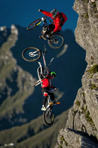 Professional trials bike rider, Kenny Belaey performs tricks a staggering 3558ft above sea level on Table Mountain,  which overlooks Cape Town, South Africa.<br /> Kenny hiked up Platteklip Gorge with