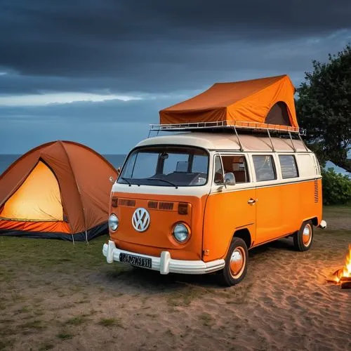 Antique orange Volkswagen van with a tent on the roof. Park for a picnic by the sea at night. There was a bonfire next to the car.,camper on the beach,camping car,vw camper,campervan,camper van isolat