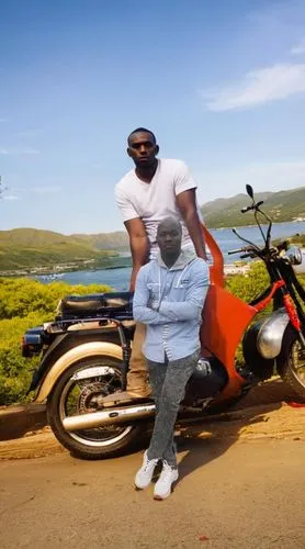 City
,a man standing next to another man on a motorcycle,kanyapat,ebz,greenscreen,motorbike,family motorcycle,kanyenda,luber,motorcycle tour,luganda,buju,motorcyle,deji,ebt,iyanya,githongo,monypenny,k