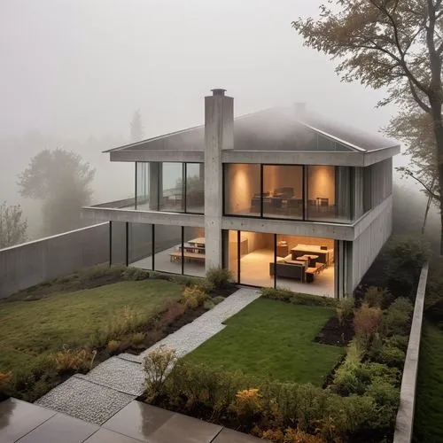 a beautiful house with very foggy weather and grass in front,modern house,morning fog,autumn fog,foggy landscape,modern architecture,foggy day,Photography,General,Realistic