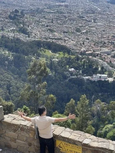 a man standing at the top of a mountain,ehden,rubidoux,bikfaya,klis,lycabettus,amman,baabda,zgharta,kruja,duhok,ramallah,pena de bernal,tarawneh,mirador del rio,tijeras,ajloun,elbaneh,jezzar,jersualem