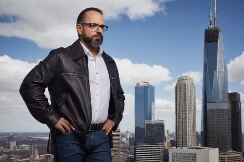 Middle-aged, male, architectural designer, MrH Design Studio, Michael Roy Hampton, standing, confident posture, glasses, short brown hair, trimmed beard, black leather jacket, white dress shirt, dark 