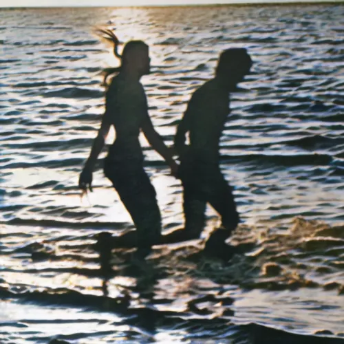 two people walking along the water as the sun goes down,walk on water,kupala,swimming people,the people in the sea,couple silhouette,slint