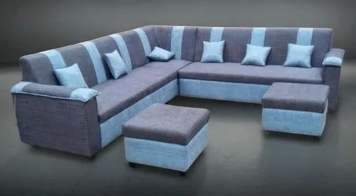 Fondo de sala lujosa para un sofa gris con celeste,a couch is sitting with some pillows on it,sofa set,seating furniture,soft furniture,sofas,loveseat,settees,settee,furniture,furnitures,wingback,sill