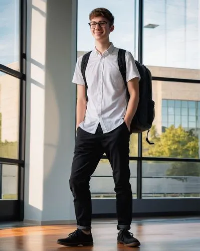 Young adult, male, solo, (22yo), short hair, glasses, white shirt, black pants, black shoes, backpack, holding a large portfolio, standing, Virginia Tech College, School of Architecture + Design build