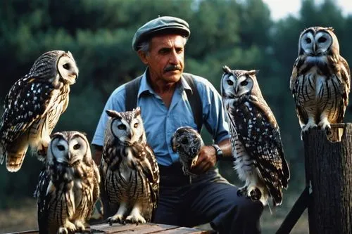 A owl trainer and his owls,owl nature,owls,falconers,owl background,pawlowicz,bubo,couple boy and girl owl,large owl,falconry,siberian owl,plaid owl,hoot,hootie,owl art,owl pattern,waxhaws,gulen,glauc