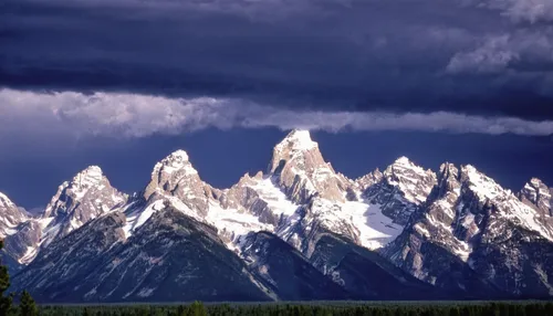 A storm clears and reveals the peaks of the Grand Tetons.,grand teton,teton,grand tetons,karakoram,giant mountains,mountain range,tannheimer mountains,mountains,mountain ranges,mountainous landforms,t