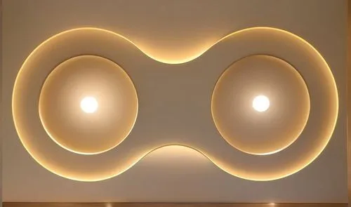 Gypsum decoration in the ceiling of a room with hidden LED lighting the ceiling,an oval room has a white wall and wooden floors,wall lamp,wall light,ceiling light,ceiling lamp,bomberman,led lamp,Photo