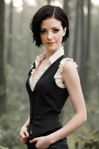 Alice Cullen, Twilight movie. White ruffle blouse, black vest, jeans, black pixie haircut. Exotic style. Curvy body ,the vampire standing in front of a forest,facinelli,tvd,alcide,somerhalder,alaric,d