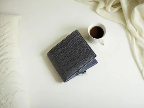 a vintage dress sits in a cozy living room, adorned with a white stitched slather pattern. The fabric is soft and inviting, with a subtle texture and a subtle yet elegant touch. A mug of steaming coff