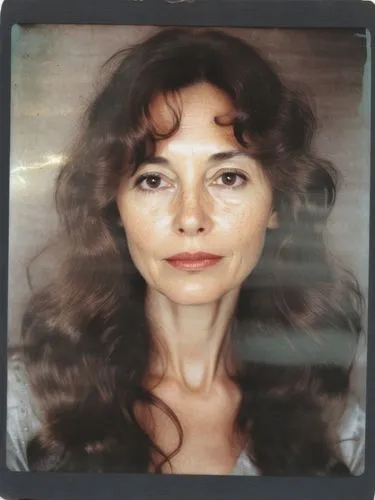 a woman with long, wavy brown hair,a woman with freckled hair looking through a window,sarandon,varda,feldshuh,lovinescu,ronstadt,gilf,Photography,Documentary Photography,Documentary Photography 03