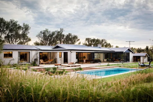 dunes house,holiday villa,holiday home,eco hotel,pool house,termales balneario santa rosa,inverted cottage,summer cottage,highveld,landscape designers sydney,summer house,mid century house,modern hous