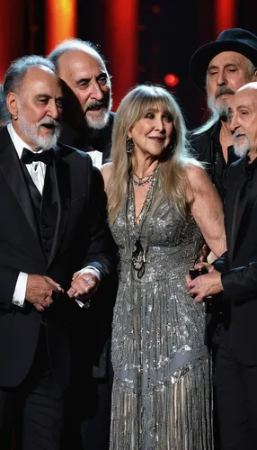 Honorees Stevie Nicks, John McVie, Christine McVie, Lindsey Buckingham, and Mick Fleetwood of the group Fleetwood Mac react after performing during the 2018 MusiCares Person of the Year show honoring 