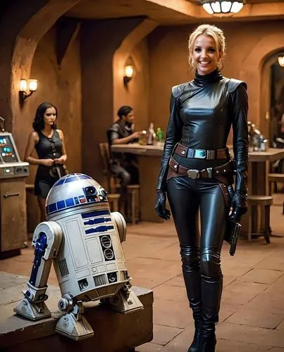 Britney Spears, sorridente,a lady dressed as a force trooper stands next to a toy c - 3po in star wars,droids,gwendoline,sarah walker,sithara,spearritt,fembot