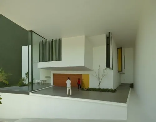 Diseño exterior de una casa estilo minimalista ubicada en un entorno Urbano, uso de colores neutros, vegetación semi tropical, personas, fotografía hiperrealista, toma cinematográfica ,interior modern