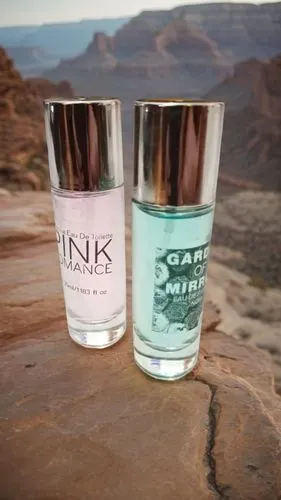 two bottles are side by side next to each other,clink glasses,cocktail glasses,salt glasses,ginandjar,pinkwater,cocktail glass,Small Objects,Outdoor,Canyon