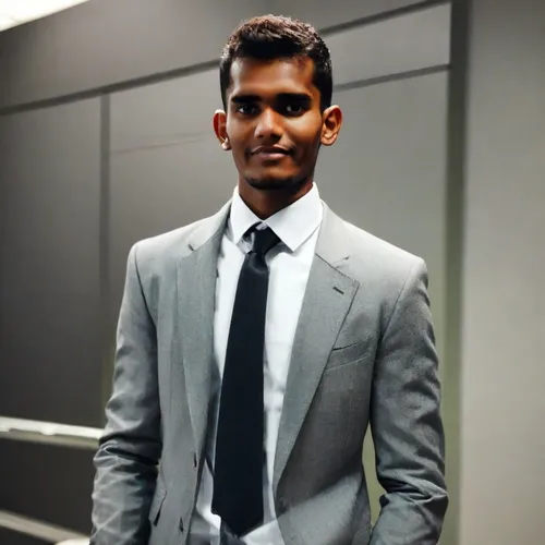 a beautiful boy sit in office ,a black man on a suit,social,men's suit,mahendra singh dhoni,malaysia student,formal guy,maldivian rufiyaa,devikund,suit actor,navy suit,wedding suit,black businessman,s